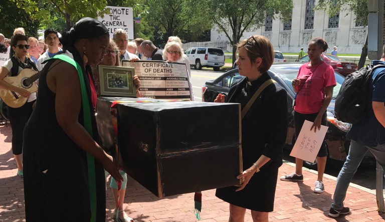 National faith leaders on Tuesday delivered a life-sized coffin and death certificate to Senate Majority Leader Mitch McConnell's office. (Faith in Public Life)