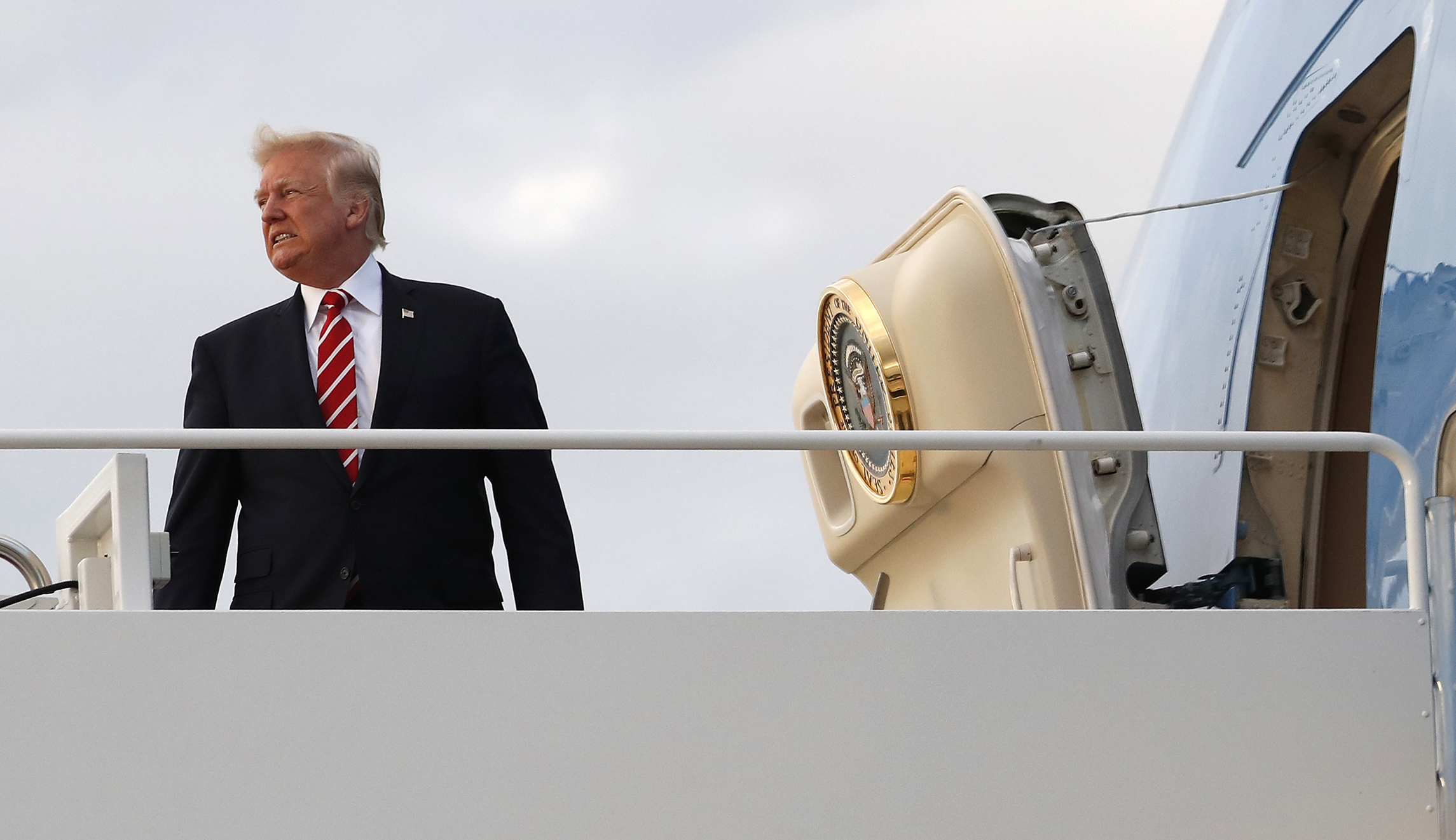 Trump leaves for Asia as tax reform and Russia probe heat up at home