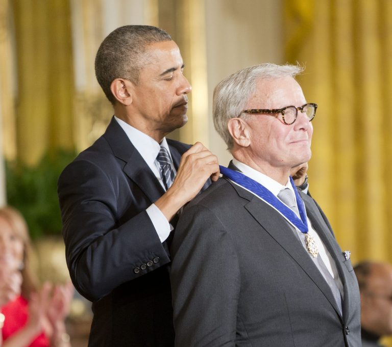 President Barack Obama awards journalist, Tom Brokaw, the Presidential Medal of Freedom, Monday, Nov. 24, 2014, during a ceremony in the East Room of the White House in Washington. President Obama is presenting the nation's highest civilian honor to 19 artists, activists, public servants and others. (AP Photo/Pablo Martinez Monsivais)
