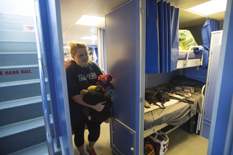 First year Texas A&M oceanography student, Rebecca Gray, boards the research boat, RV Manta Tuesday, June 17, 2014, on Pelican Island in Galveston, Texas. She and a group of faculty and students from Texas A&M will study the 