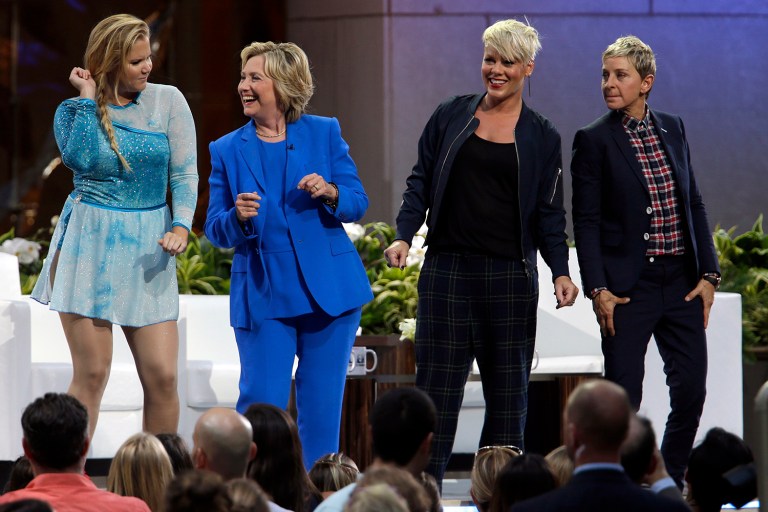 Actress Amy Schumer, left, Democratic presidential candidate Hillary Clinton, musician Pink and Ellen DeGeneres dance on stage during 