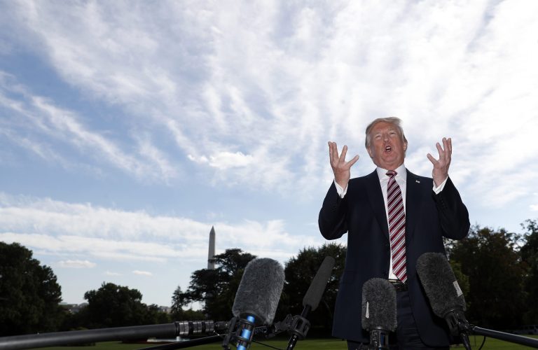 President Donald Trump speaks to the media as he walks to Marine One as he departs the White House, Friday, Sept. 29, 2017, in Washington. Trump is en route to Bedminster, N.J.(AP Photo/Alex Brandon)