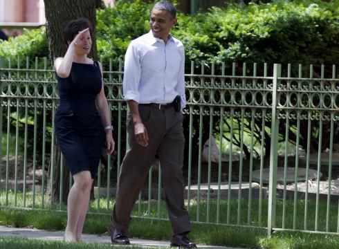 President Obama walks through his Chicago neighborhood with senior adviser Valerie Jarrett. She is expected to have a big role in his presidential library. AP Photo