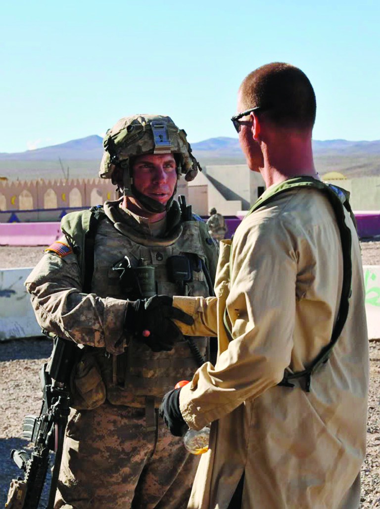 FILE - In this Aug. 23, 2011, file photo, Defense Video & Imagery Distribution System photo, Staff Sgt. Robert Bales, left, 1st platoon sergeant, Blackhorse Company, 2nd Battalion, 3rd Infantry Regiment, 3rd Stryker Brigade Combat Team, 2nd Infantry Division participates in an exercise at the National Training Center at Fort Irwin, Calif. The preliminary hearing for Bales, accused of killing 16 Afghan civilians in March, begins Monday, Nov. 5, 2012, with villagers expected to testify by video from Kandahar Air Field in Afghanistan. Bales is scheduled to appear at Joint Base Lewis-McChord for the pretrial hearing, which is expected to last two weeks. (AP Photo/DVIDS, Spc. Ryan Hallock, File)