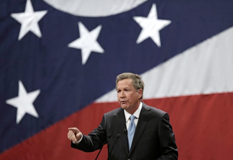 Ohio Gov. John Kasich delivers his State of the State address at the Performing Arts Center Monday, Feb. 24, 2014, in Medina, Ohio. (AP Photo/Tony Dejak)
