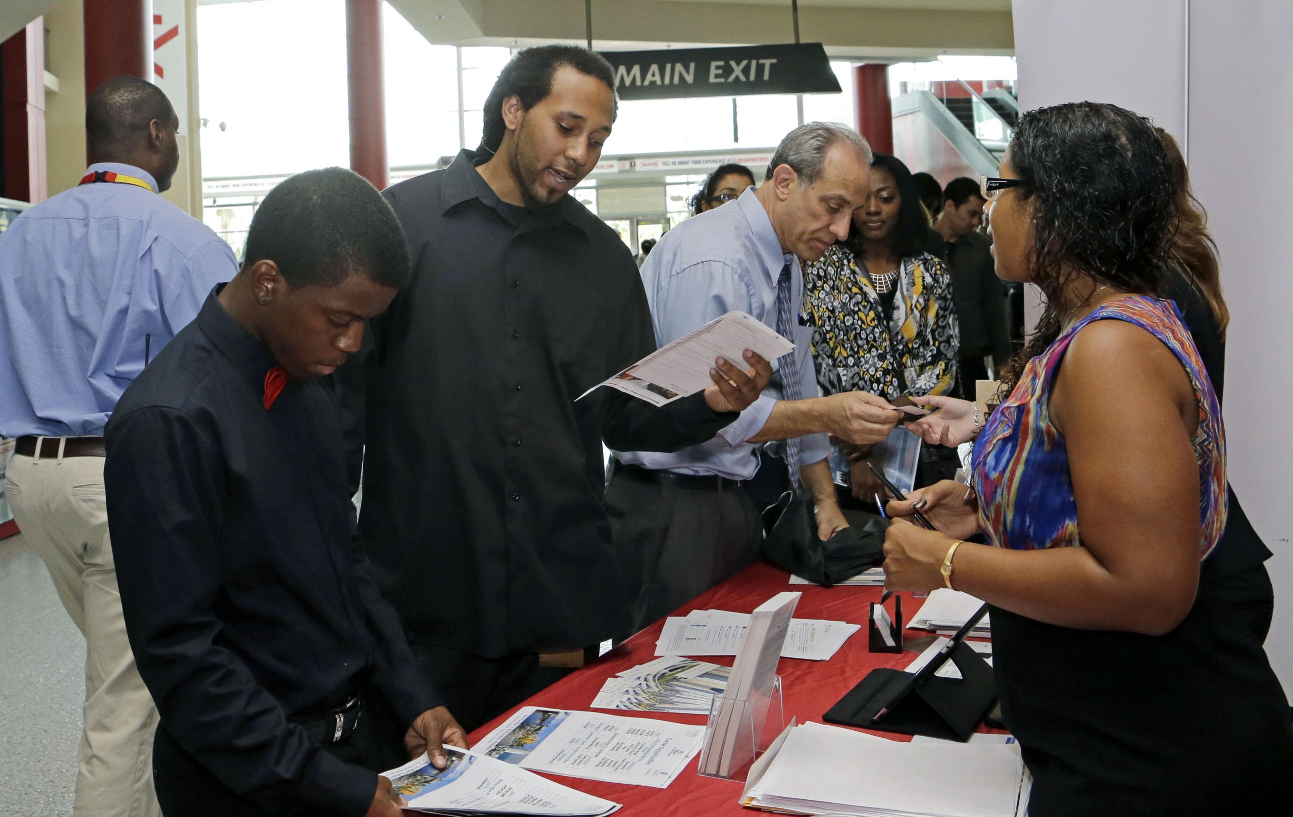 US job openings stay near 13-year high; hiring up