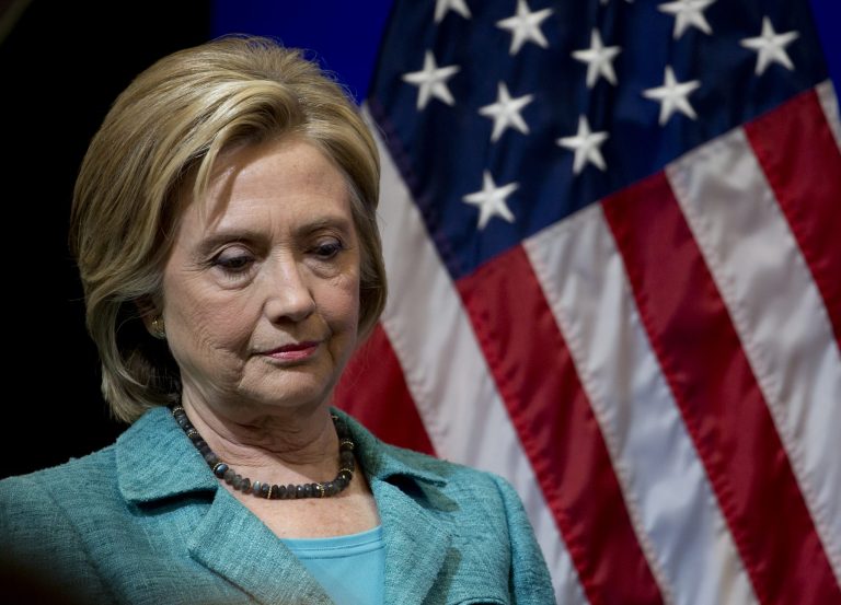 Democratic presidential candidate Hillary Rodham Clinton pauses as she is introduced to speak at the Brookings Institution in Washington, Wednesday, Sept. 9, 2015. (AP Photo/Carolyn Kaster)
