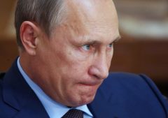 Putin tones down rhetoric on Ukraine