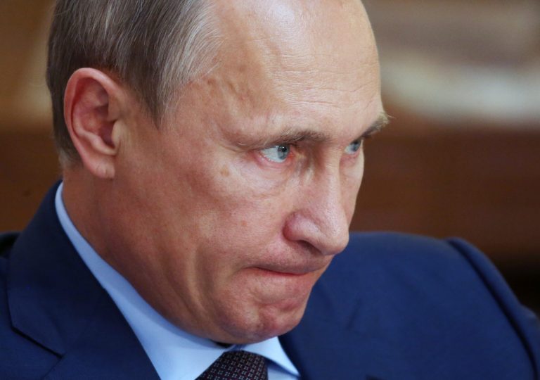 Russian President Vladimir Putin pauses, during a meeting with cultural figures at Chekhov museum in the Black Sea resort of Yalta, Crimea, Thursday, Aug. 14, 2014.  Putin addressed hundreds of lawmakers Thursday in Yalta in Crimea, which was annexed by Russia from Ukraine in March.