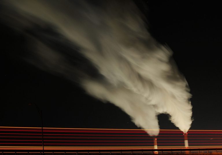 Smoke rises in this time exposure image from the stacks of the La Cygne Generating Station coal-fired power plant in La Cygne, Kan. (AP Photo)