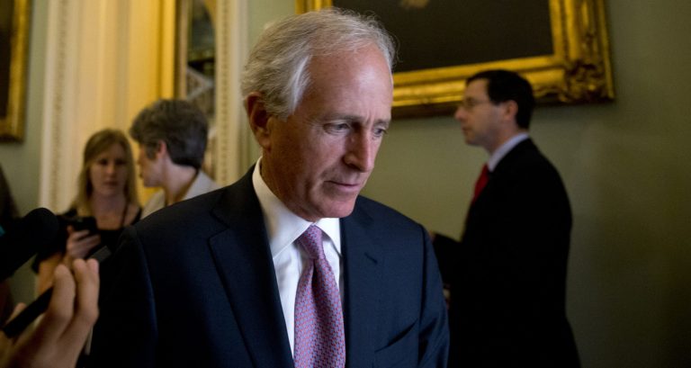 Sen. Bob Corker, R-Tenn., pauses to talk to a reporter as he walks to a policy luncheon on Capitol Hill in Washington, Wednesday, July 8, 2015. (AP Photo/Carolyn Kaster)