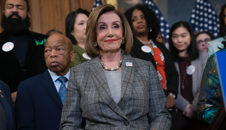 Speaker of the House Nancy Pelosi, D-Calif., joined by civil rights leader Rep. John Lewis, D-Ga., left, holds an event before passing the Voting Rights Advancement Act to eliminate potential state and local voter suppression laws, at the Capitol in Washington, Friday, Dec. 6, 2019. (AP Photo/J. Scott Applewhite)