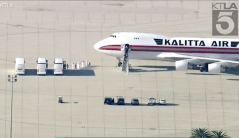 WATCH: American evacuees from Wuhan met by officials in hazmat suits in California