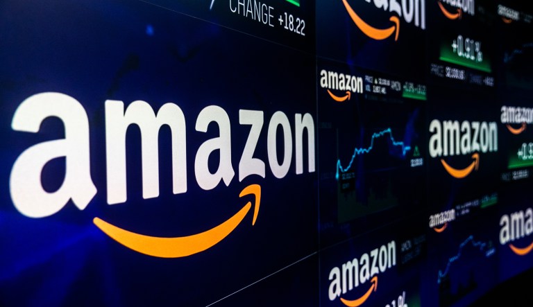 A monitor displays Amazon.com Inc. stock information at the Nasdaq MarketSite in New York, U.S., on Tuesday, Sep. 4, 2018. Amazon.com Inc.Â briefly became America's second trillion-dollar company on Tuesday after adding $434 billion to its market cap this year.