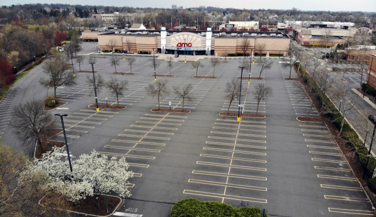 Entrance to AMC Bay Street 16 theater is seen on Wednesday, June 20, 2018, in Emeryville, Calif. AMC Theatres, the world's largest movie theater chain, on Wednesday unveiled a $20-a-month subscription service to rival the flagging MoviePass. 
