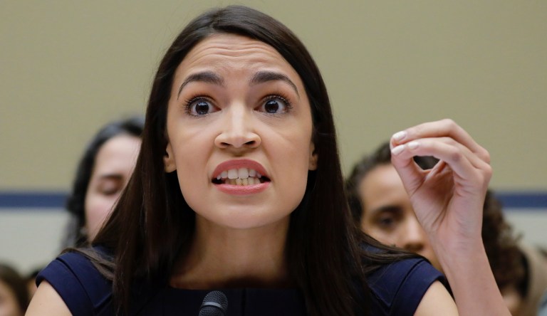 Rep. Alexandria Ocasio-Cortez, D-NY., gestures while testifying before the House Oversight Committee hearing on family separation and detention centers, Friday, July 12, 2019 on Capitol Hill in Washington.
