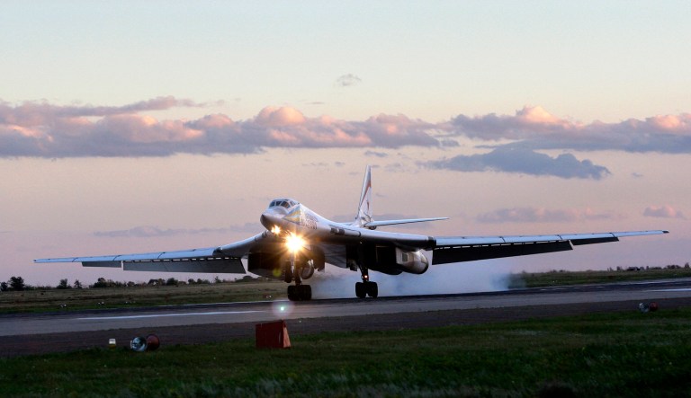 Russia's strategic bomber Tu-160, the largest supersonic bomber in the world, lands at Engels Air Base near Saratov, about 700 kilometers (450 miles) southeast of Moscow, Thursday, Aug. 7, 2008.