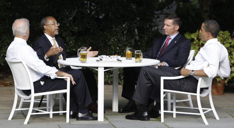 Beer Summit. In this July 30, 2009 photo, President Barack Obama, right, and Vice President Joe Biden, left, have a beer with Harvard scholar Henry Louis Gates Jr., second from left, and Cambridge, Mass., police Sgt. James Crowley in the Rose Garden of the White House in Washington. A review of the case released Wednesday, June 30, 2010, said both Gates and Crowley missed opportunities to "ratchet down" the situation and end things more calmly during a confrontation when Gates was arrested outside his Cambridge home in July 2009. (AP Photo/Alex Brandon, File)