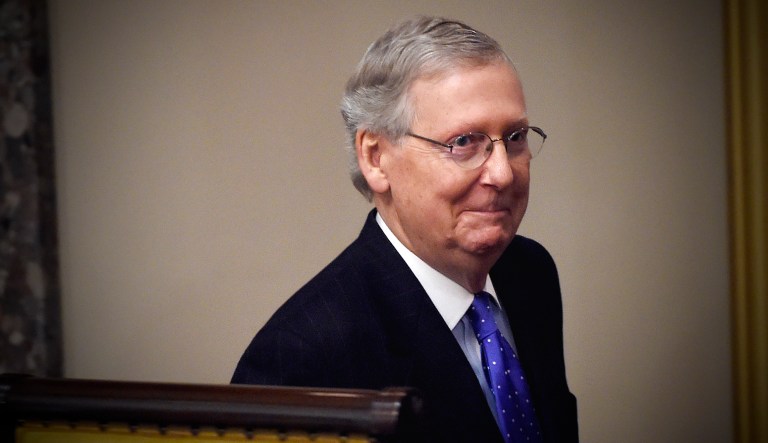 Senate Majority Leader Mitch McConnell, R-Ky., smiles after an event.