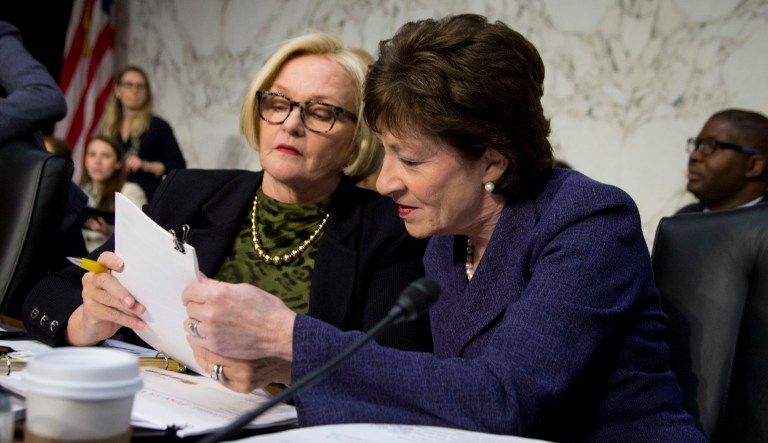 Sens. Susan Collins, R-Maine, right, and Claire McCaskill, D-Mo., confer on Capitol Hill in Washington  prior to the start of their committee's hearing on drastic price hikes. 