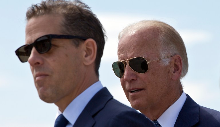 Family members gather for a road naming ceremony with U.S. Vice President Joe Biden, centre, his son Hunter Biden, left, and his sister Valerie Biden Owens, right, joined by other family members during a ceremony to name a national road after his late son Joseph R. "Beau" Biden III, in the village of Sojevo, Kosovo, on Wednesday, Aug. 17, 2016.