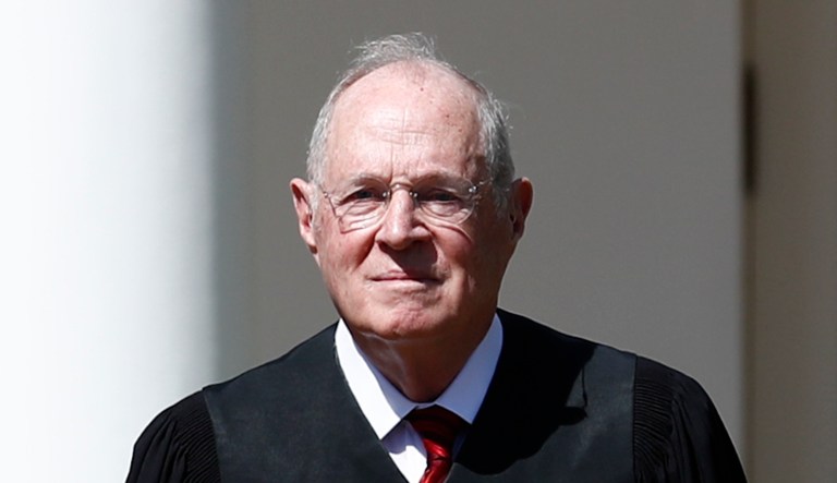 Then-Supreme Court Justice Anthony Kennedy participates in an event in the Rose Garden of the White House in Washington.