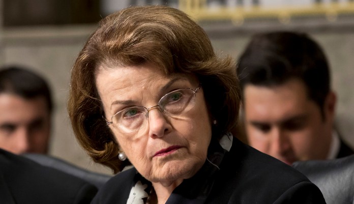 In this June 12, 2013, file photo, Sen. Dianne Feinstein, D-Calif., right, chair of the Senate Intelligence Committee, and Sen. Dick Durbin, D-Ill., listen to testimony from Gen. Keith B. Alexander, director of the National Security Agency and head of the U.S. Cyber Command before the Senate Appropriations Committee. U.S. authorities have said they are reducing the amount of time they will delay deporting the few immigrants in the country illegally awaiting congressional decisions to legalize their immigration status after lawmakers file so-called "private bills" supporting their last-ditch bids to remain in the country. Senators Durbin and Feinstein criticized the decision to change longstanding practices they said was made without consulting lawmakers. 