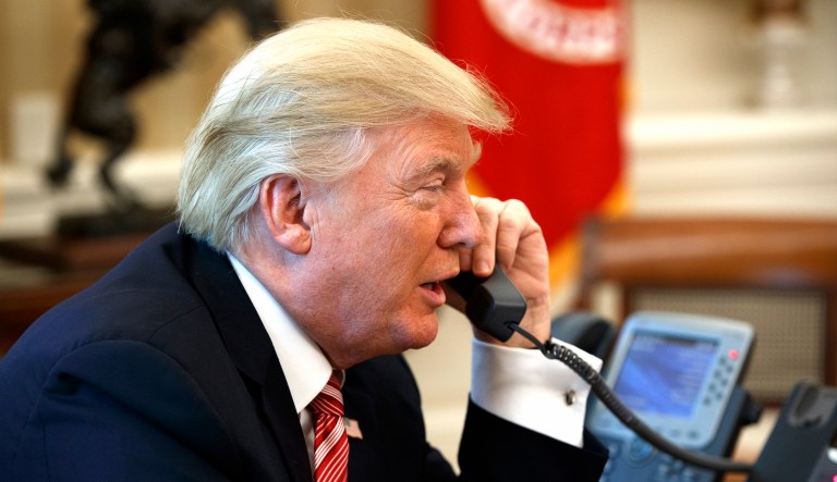 President Trump holds a phone call in the Oval Office of the White House in Washington, D.C.