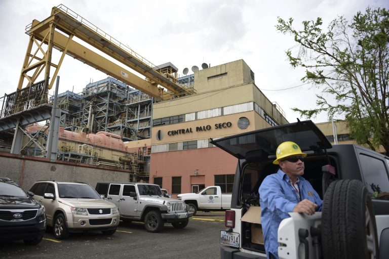 PREPA employee Jose Colon Maldonado waits for Governor Ricardo Rossello and staff from the army engineers corps to take a tour thru the facilities of the Palo Seco Thermal Power Plant, which the Electric Power Authority plans to activate in order to energize different areas of the metropolitan area, 28 days after the passage of hurricane Maria, in Catano, Puerto Rico, Wednesday, Oct. 18, 2017. A month after Hurricane Maria rolled across the center of Puerto Rico, power is still out for the vast majority of people as the work to restore hundreds of miles of transmission lines and thousands of miles of distribution lines grinds on.