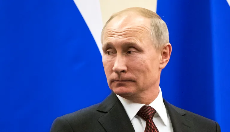 Russian President Vladimir Putin appears at a meeting.