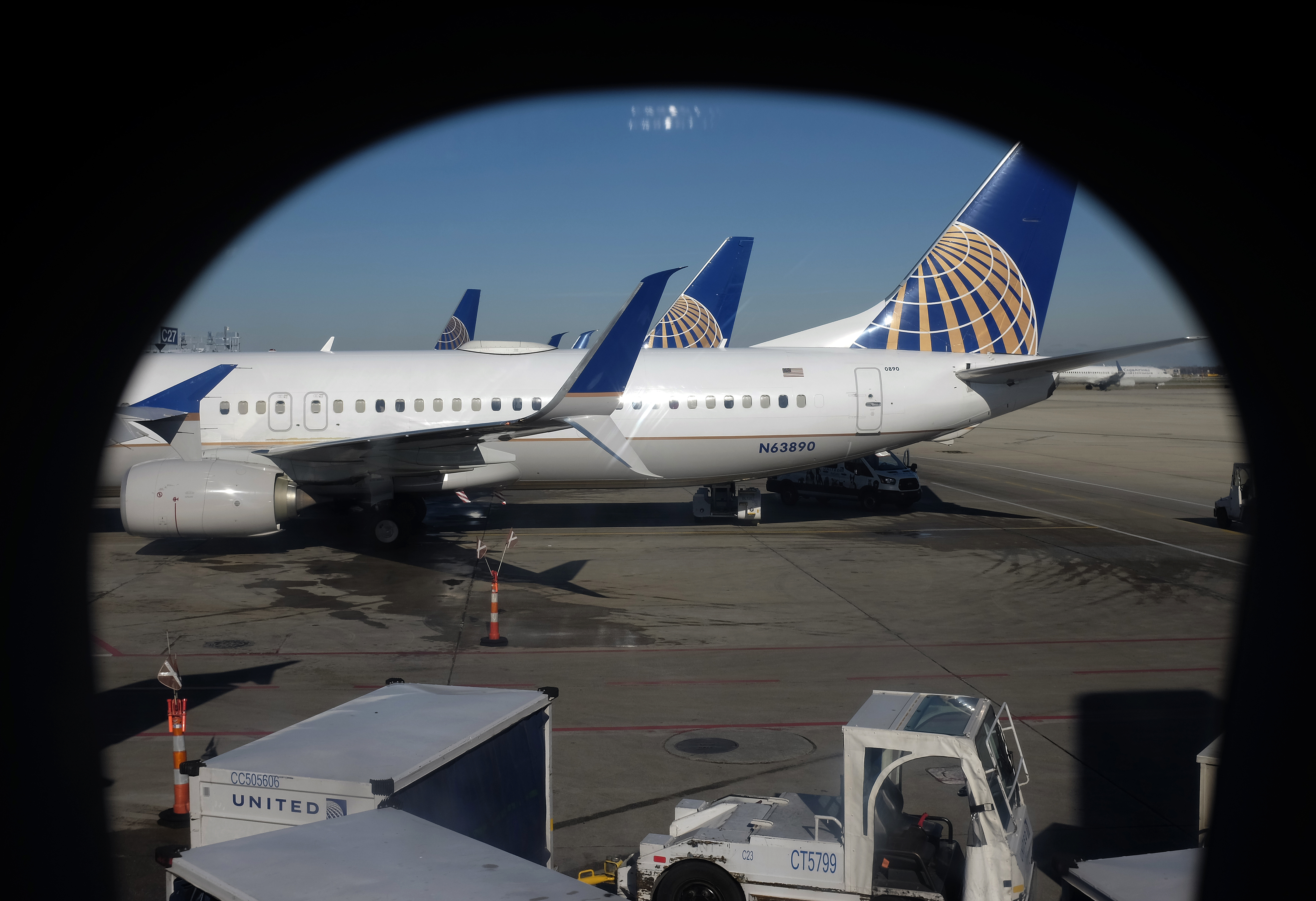 Passenger arrested after trying to open emergency exit and stab flight attendant