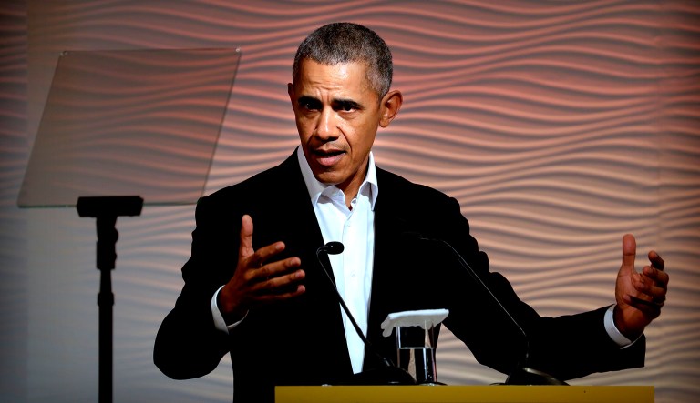 Former President Barack Obama speaks during a leadership summit.