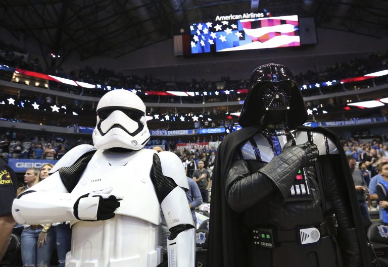 President Trump's desire for a new "Space Force" faces an uphill battle. Here, Darth Vader and a Storm Trooper stand during the national anthem before an NBA basketball game between the LA Clippers and Dallas Mavericks in Dallas, Saturday, Dec. 2, 2017.