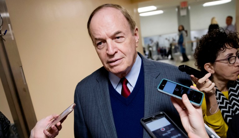 Reporters seek a comment from Sen. Richard Shelby, R-Ala., on Capitol Hill in D.C.