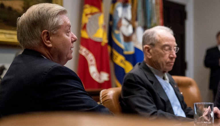 From left, Sen. Lindsey Graham, R-S.C., accompanied by Sen. Chuck Grassley, R-Iowa, President Donald Trump, and Sen. Thom Tillis, R-N.C., speaks during a meeting on immigration in the Roosevelt Room at the White House, Thursday, Jan. 4, 2018, in Washington.