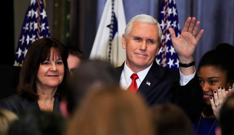 Vice President Mike Pence with his wife Karen Pence, left, waves to anti-abortion supporters and participants of the annual March for Life event, during a reception in the Indian Treaty Room at the Eisenhower Executive Office Building on the White House complex in Washington, Thursday, Jan. 18, 2018.