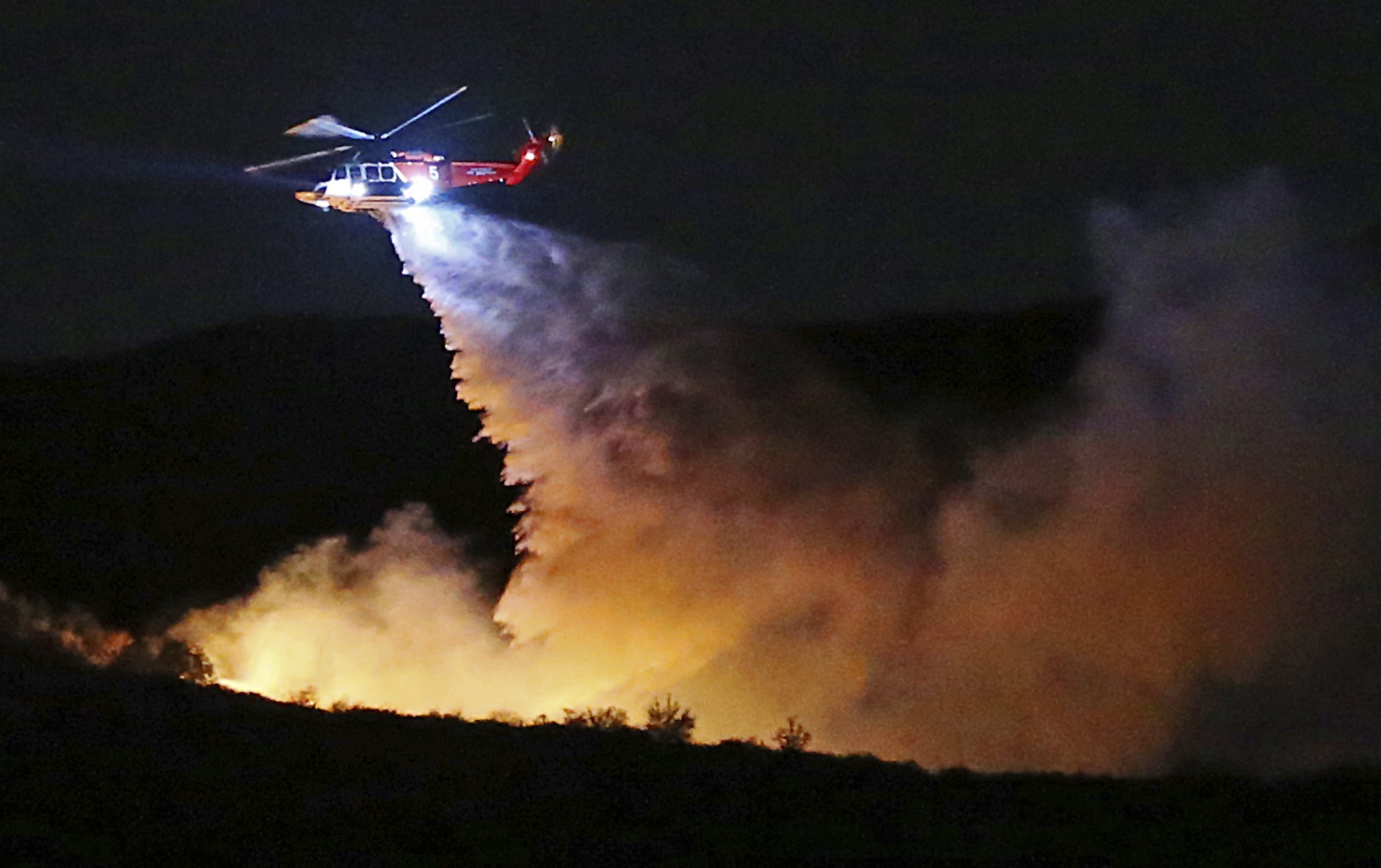 Congress reaches long-sought deal to fund wildfire prevention as part of massive spending bill
