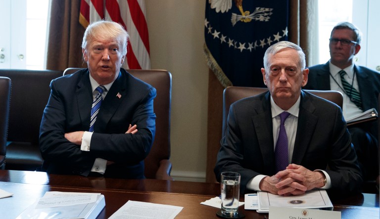 Secretary of Defense Jim Mattis, right, listen as President Trump speaks during a cabinet meeting at the White House.