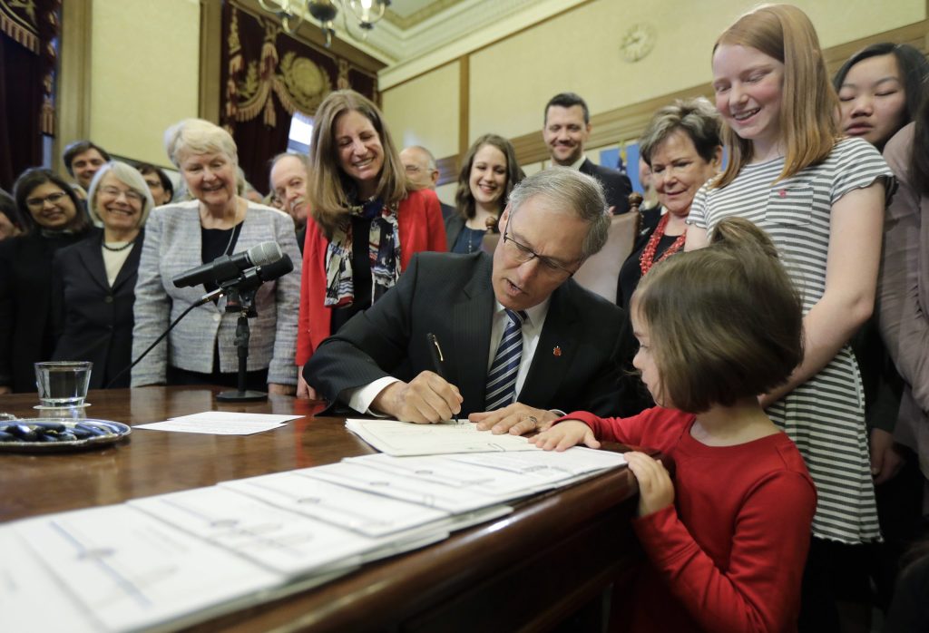 Washington state passes law to require insurance coverage of abortion
