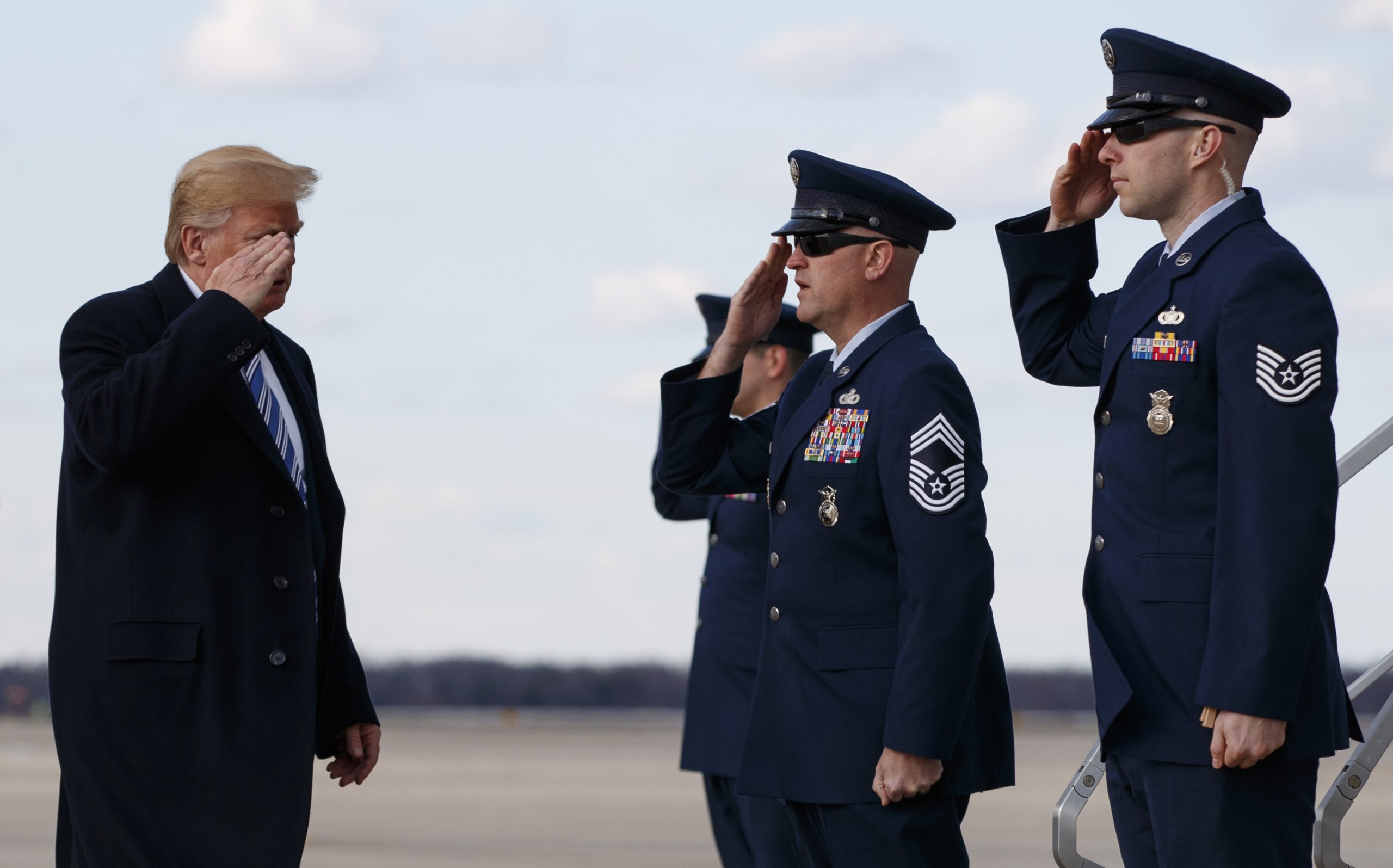 Trump cancels all-out ban on transgender troops, will allow some to serve