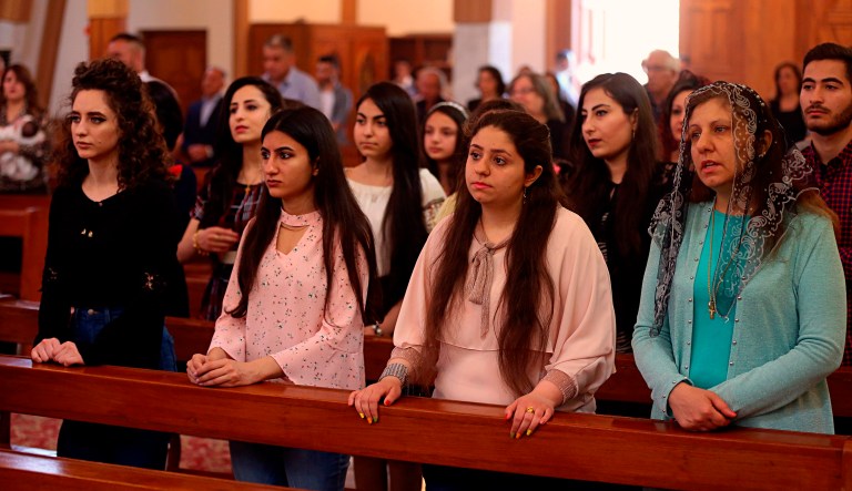 Iraqi Christians attend Mass at Our Lady of Salvation Church in Baghdad, Iraq.
