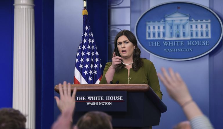 White House press secretary Sarah Huckabee Sanders calls on a reporter during the daily briefing at the White House in Washington.