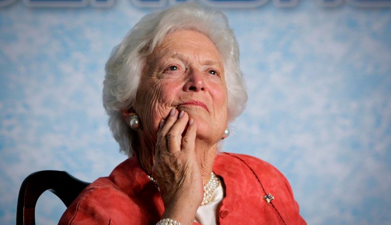 In this photo from Friday, March 18, 2005, former first lady Barbara Bush listens to her son, President George W. Bush, as he speaks on Social Security reform in Orlando, Fla. 