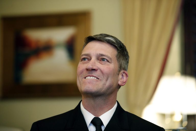 U.S. Navy Rear Admiral Ronny Jackson, M.D., sits with Sen. Johnny Isakson, R-Ga., chairman of the Veteran's Affairs Committee, before their meeting on Capitol Hill, Monday, April 16, 2018 in Washington. Jackson is President Donald Trump's nominee to be the next Secretary of Veterans Affairs.