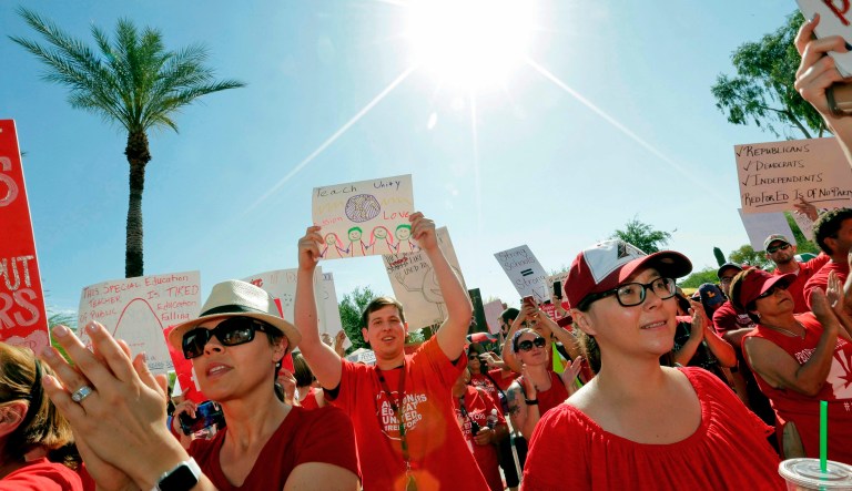 Arizona teachers’ walkout ends after governor signs off on 20 percent raise