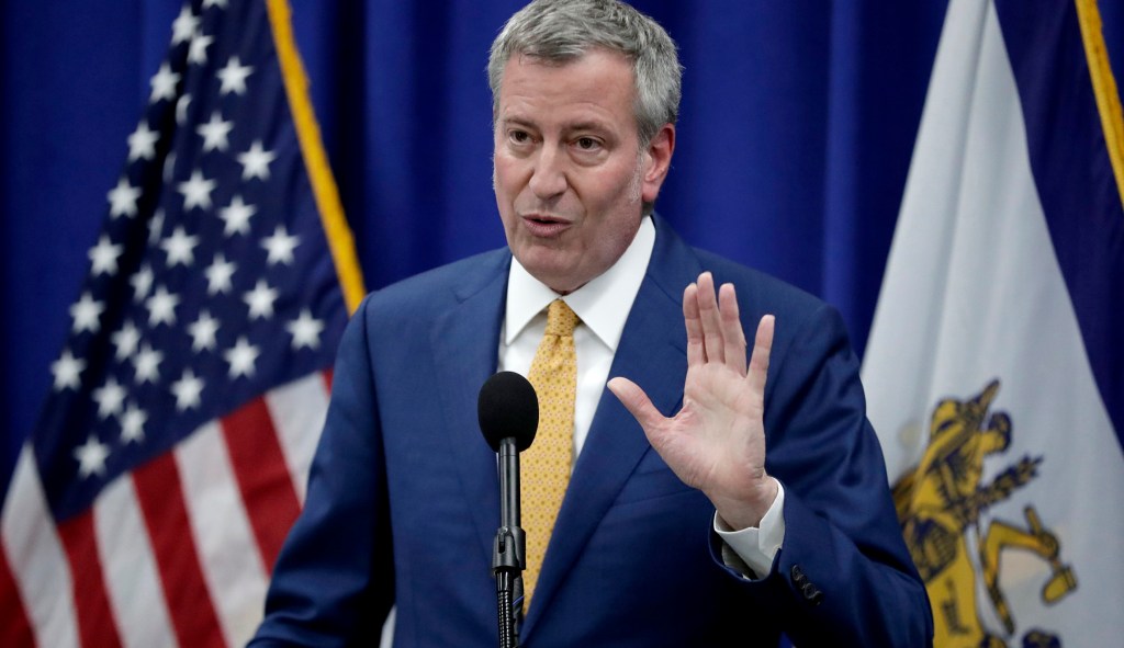 NYC protesters boo and turn back on Bill de Blasio