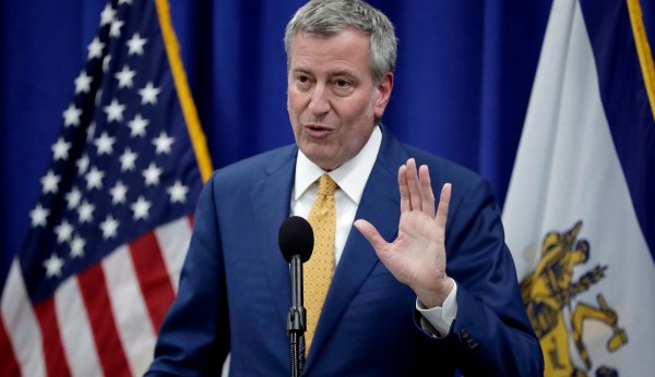 NYC protesters boo and turn back on Bill de Blasio