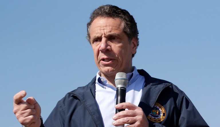 Gov. Andrew Cuomo, D-N.Y., talks to reporters.