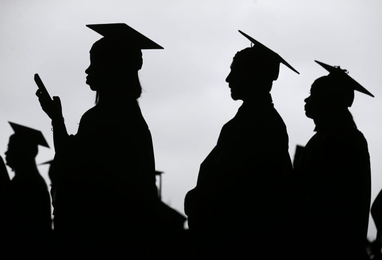 New graduates line up before the start of the Bergen Community College commencement at MetLife Stadium in East Rutherford, N.J., Thursday, May 17, 2018.
