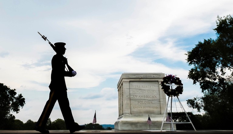 A member of the U.S. Army 3rd Infantry Regiment walks his post in front of The Tomb of the Unknown Soldier in Arlington National Cemetery during the Memorial Day weekend in Arlington, Va., Sunday.